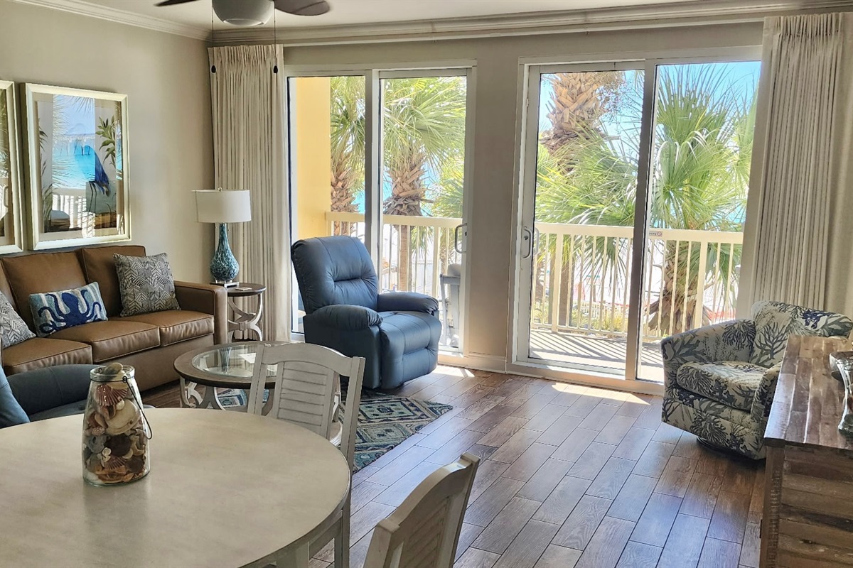 Beautiful view out the sliding doors to the inviting balcony.