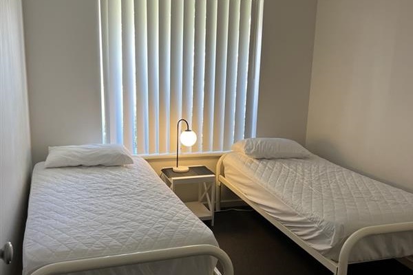 Bedroom 3 with 2 single beds & built-in robe