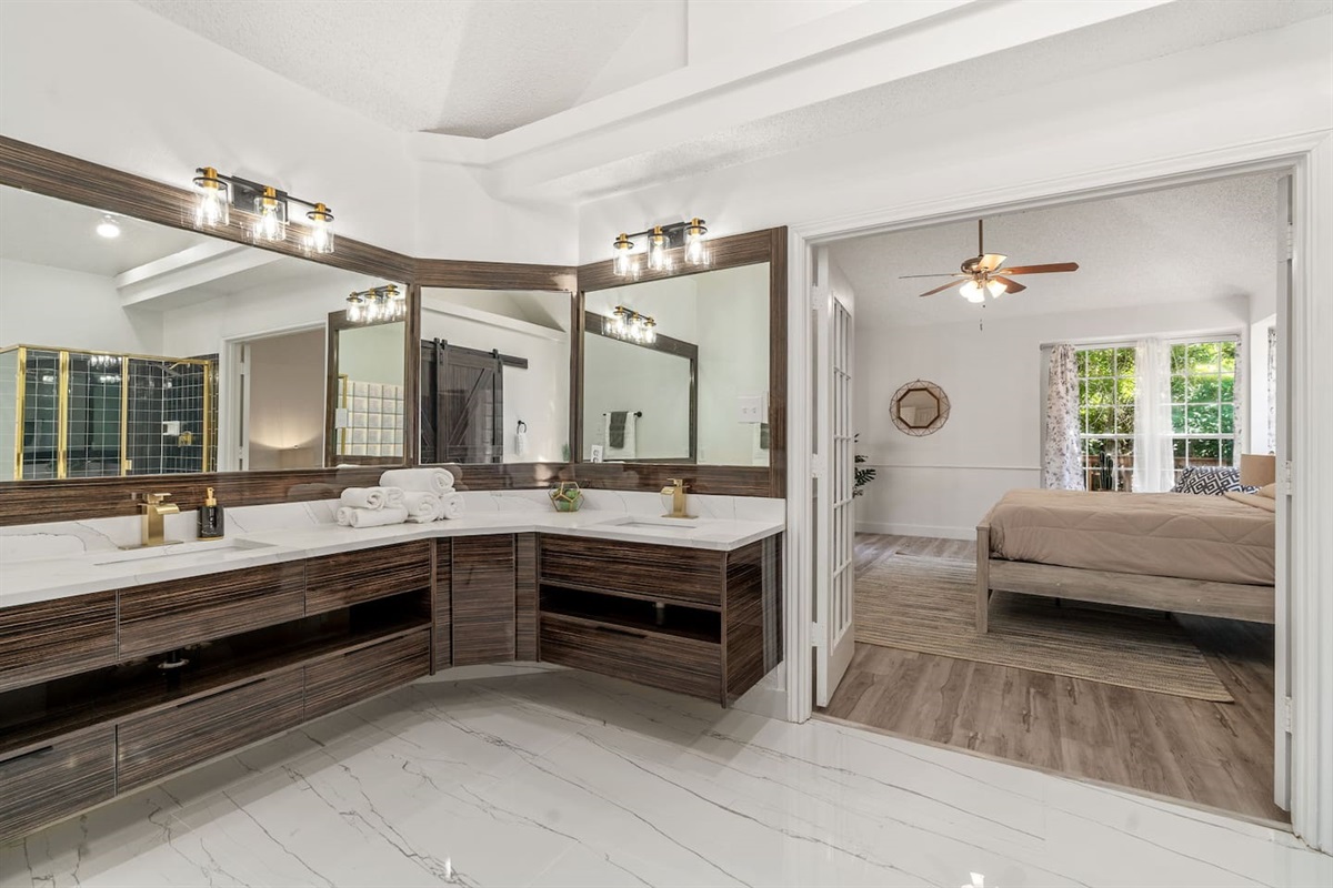 Oversized bathroom with modern amenities and luxe Ginger Lily Farms bath products.