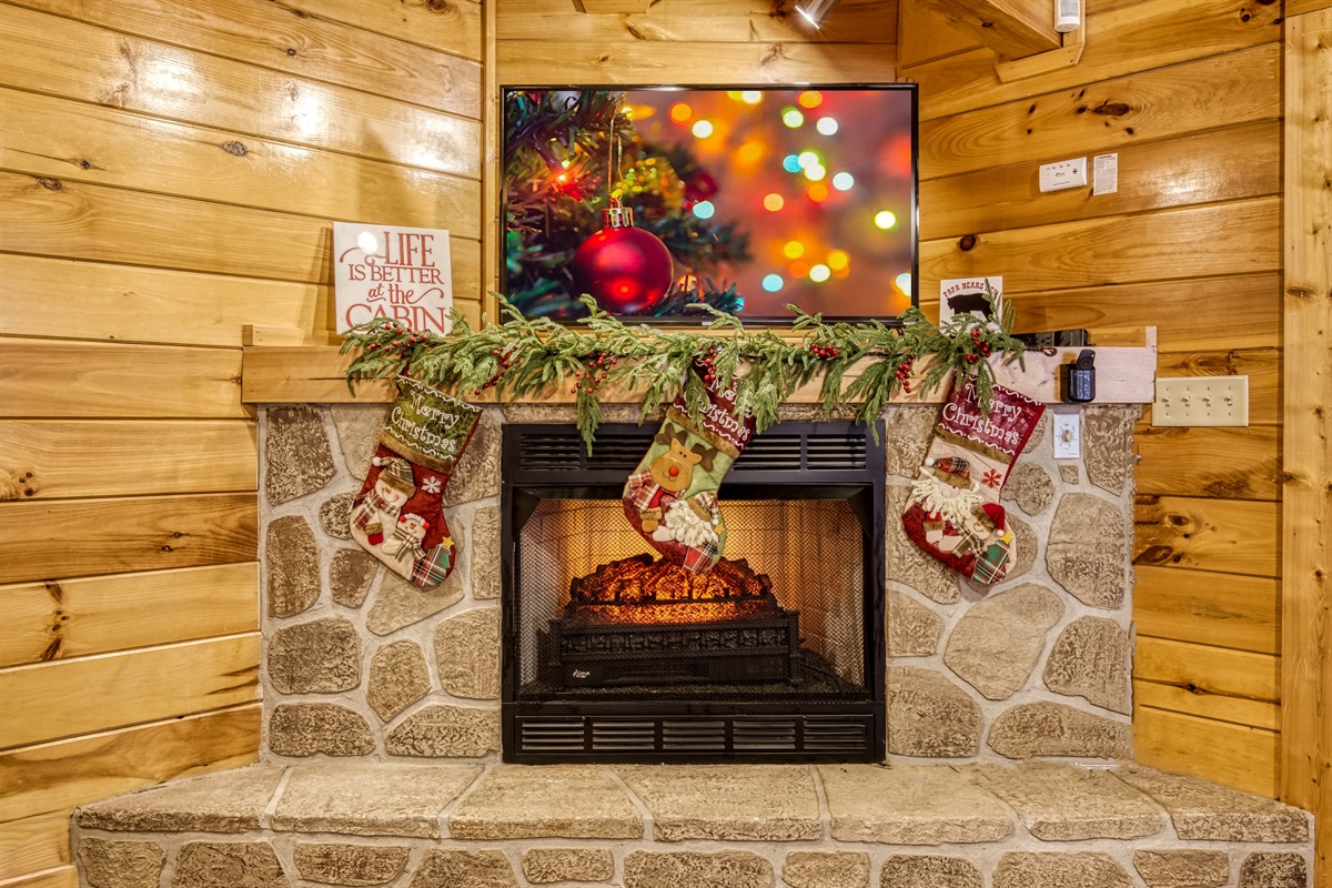 Fireplace inside main level king bedroom