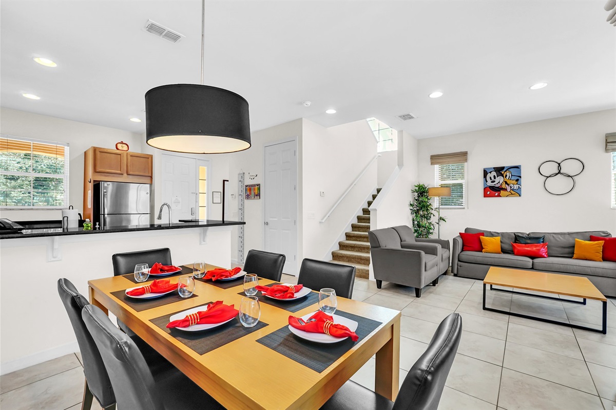 Dining area overlooking kitchen and living room