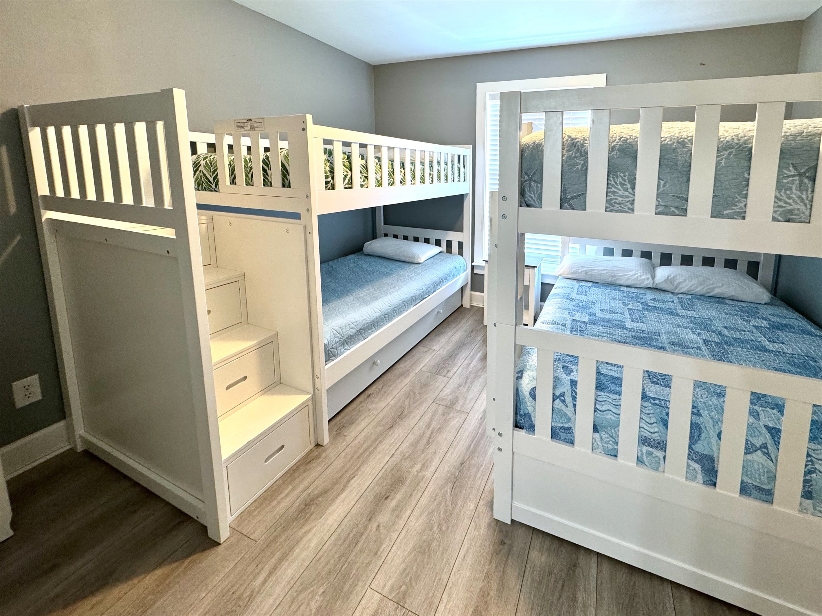 Twin/twin bunk bed with stairs & storage that kids love! This room has its own bath with tub/shower too!