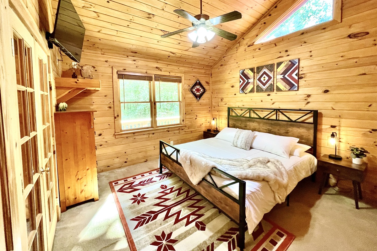 Master Bedroom with High Ceilings and Smart TV