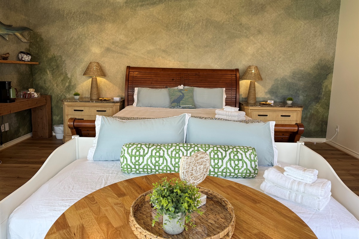 The Intracoastal Waterway Suite is stunning!  Upstairs Primary King Suite –Spacious king retreat with coffee bar, cozy electric fireplace, and a 55” smart TV. Step onto the upper-level deck for amazing beach views—or stay tucked in and watch! 
