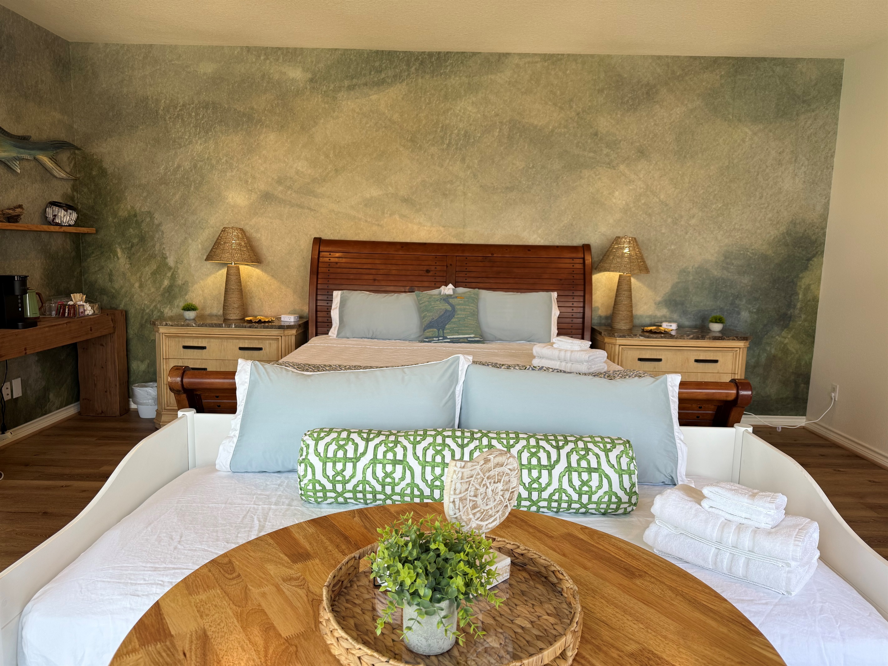 The Intracoastal Waterway Suite is stunning!  Upstairs Primary King Suite –Spacious king retreat with coffee bar, cozy electric fireplace, and a 55” smart TV. Step onto the upper-level deck for amazing beach views—or stay tucked in and watch! 
