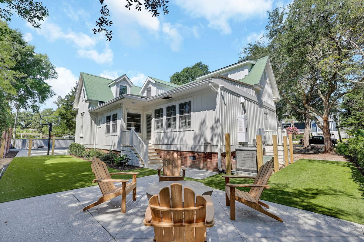 Outdoor patio space along the side of the home. Easily accessed through kitchen.