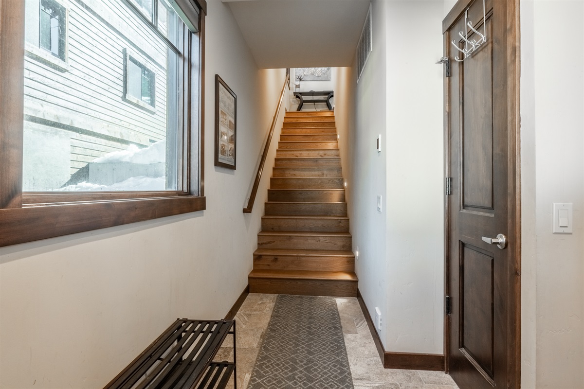 This three-story home is designed for easy living: park and enter on the first level, relax and entertain on the spacious second-floor living area, then head upstairs to find two primary bedrooms, baths, and the convenient washer and dryer.