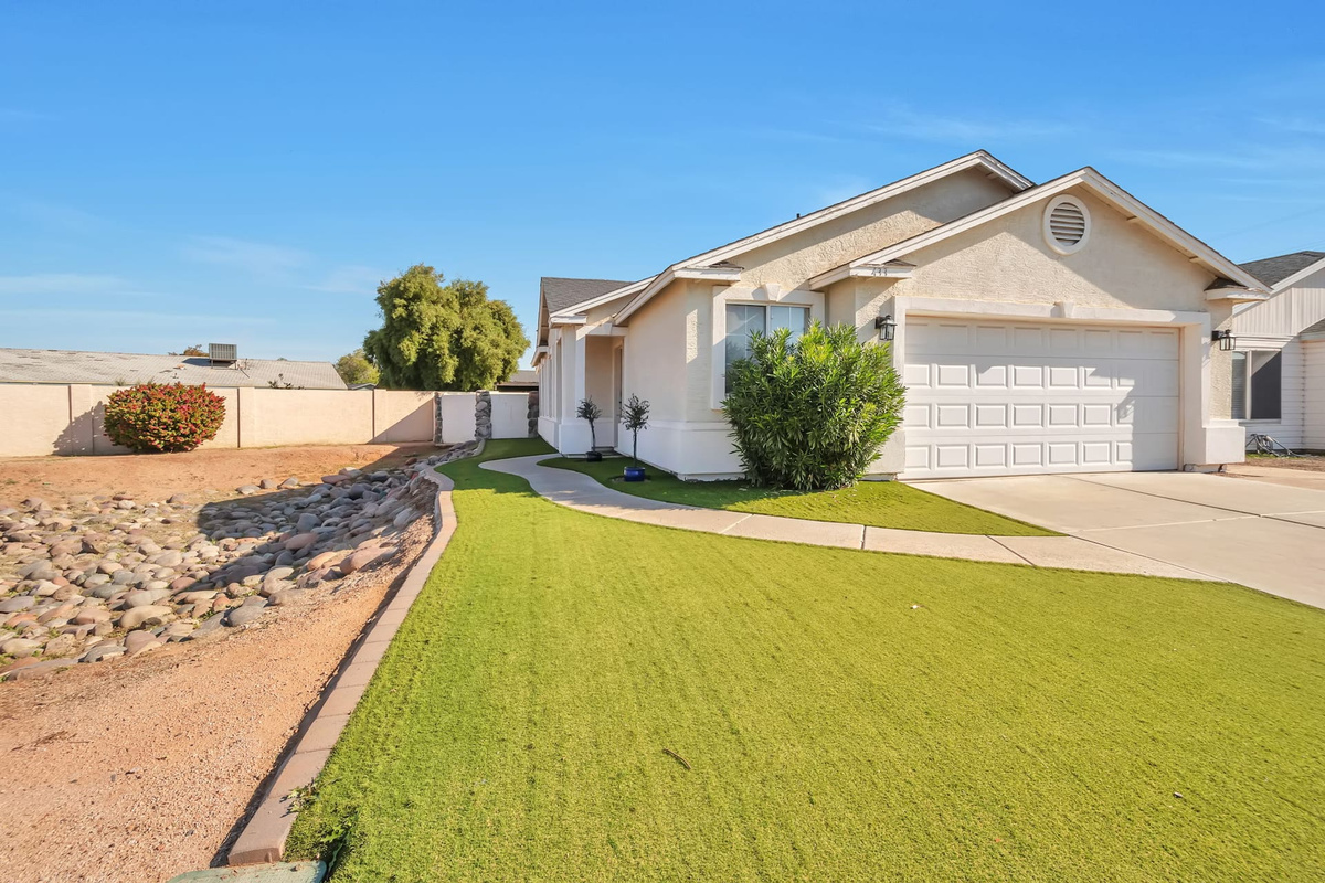 Welcome home — a tidy Gilbert house with a garage, driveway, and easy desert curb appeal