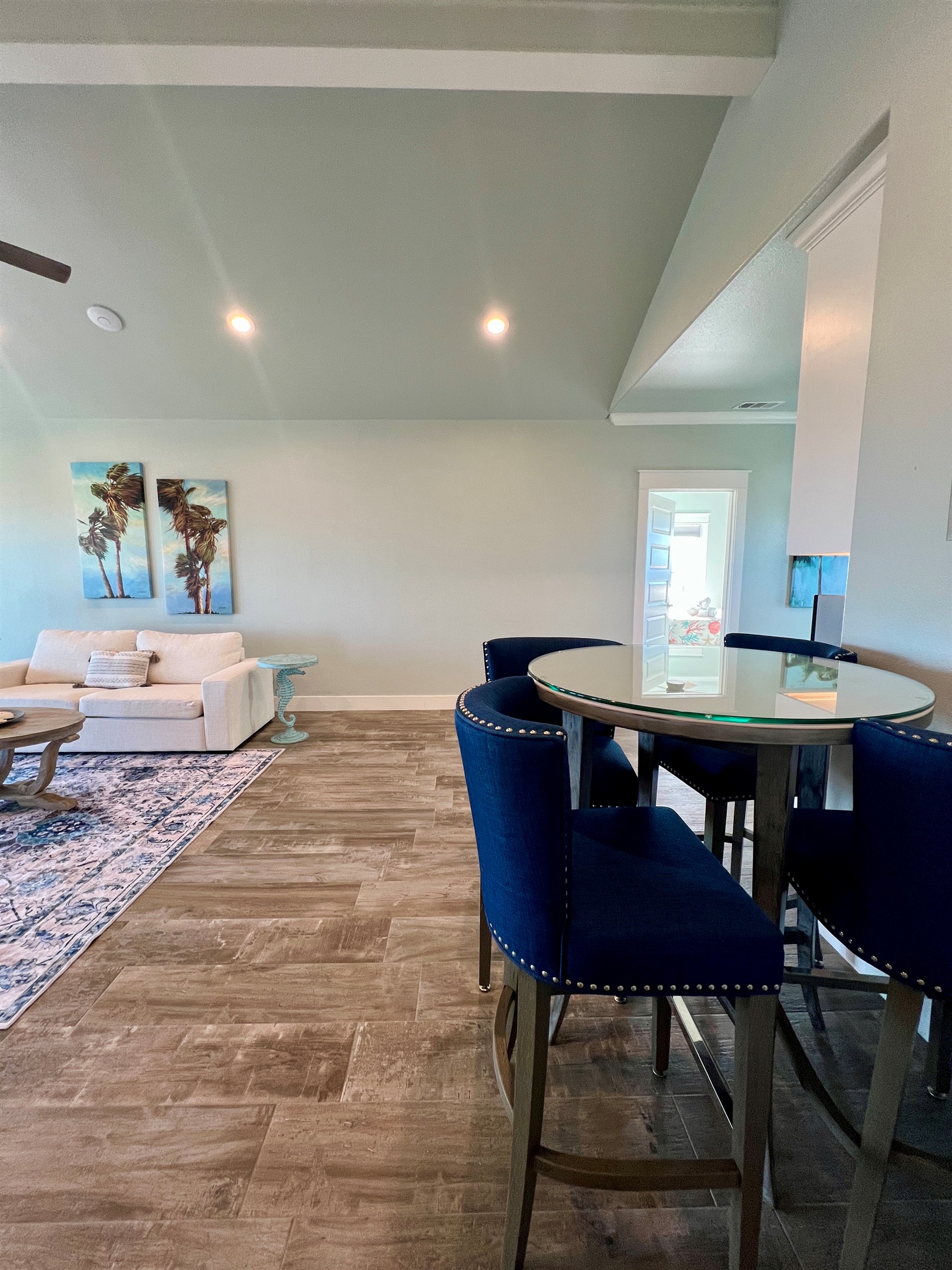 Crystal Paradise Media Room: Stylish media room with ample seating and versatile layout for family fun.