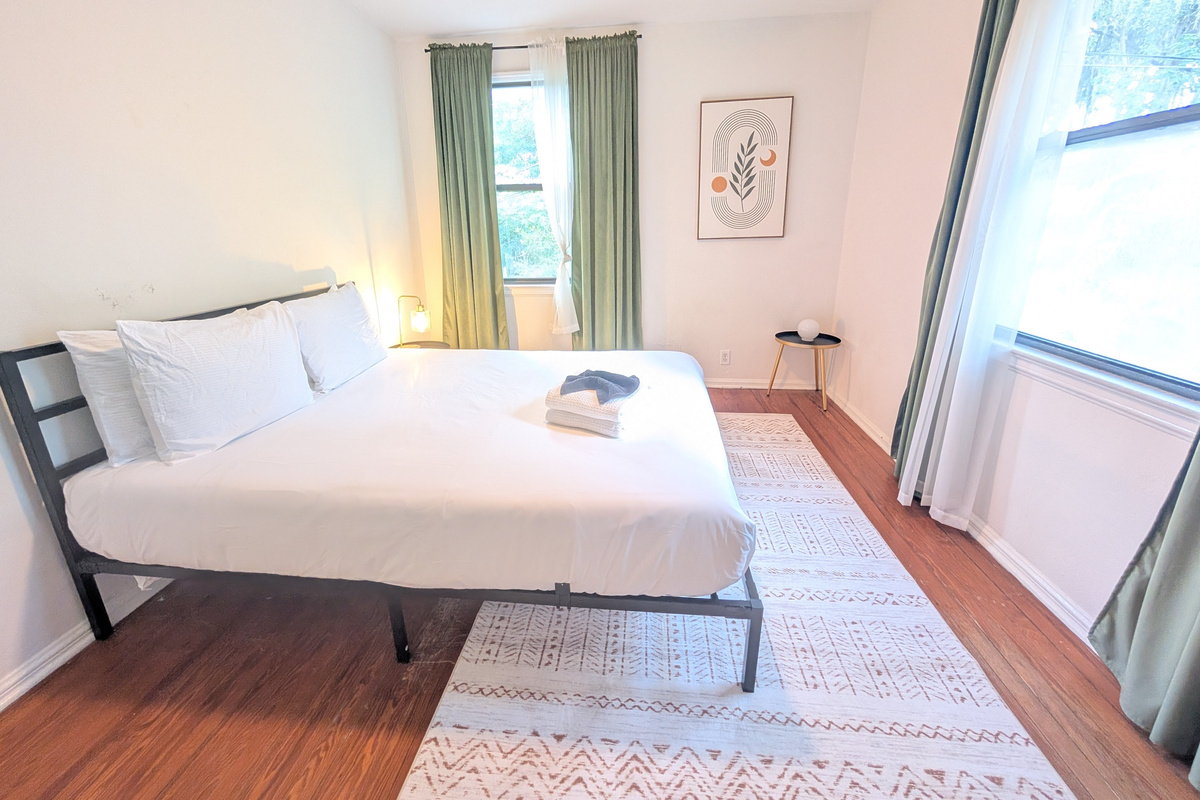 Well lit guest bedroom