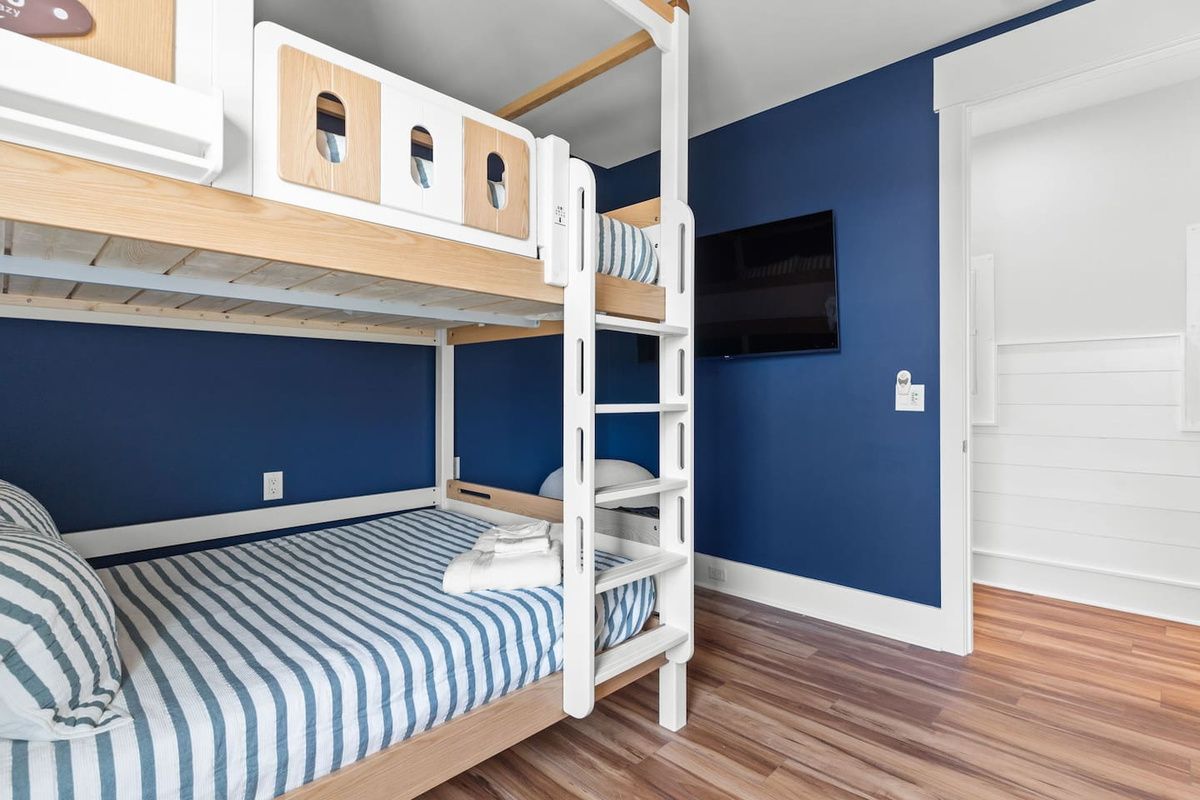 Designed with families in mind, the bunk room gives younger guests their own special space to relax and recharge. Settle in for movie nights on the 55-inch smart TV after days spent at the beach, pool, or volleyball court.