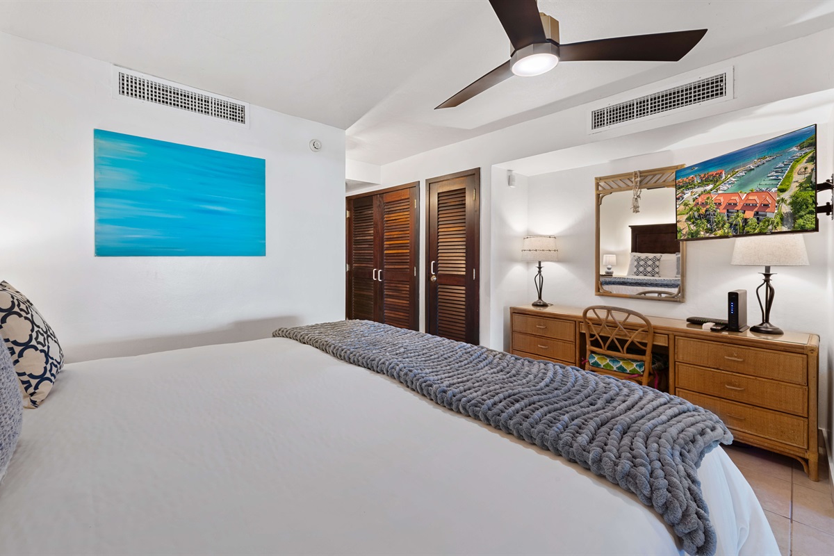 Vanity and smart TV just across from the bed