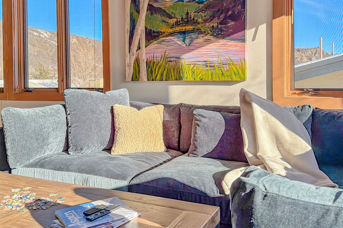 High-end details, such as artwork and a cozy, natural gas, fireplace make serenity at Snowmass stand out from the crowd.