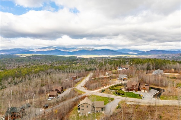 See the full property and surroundings from above.