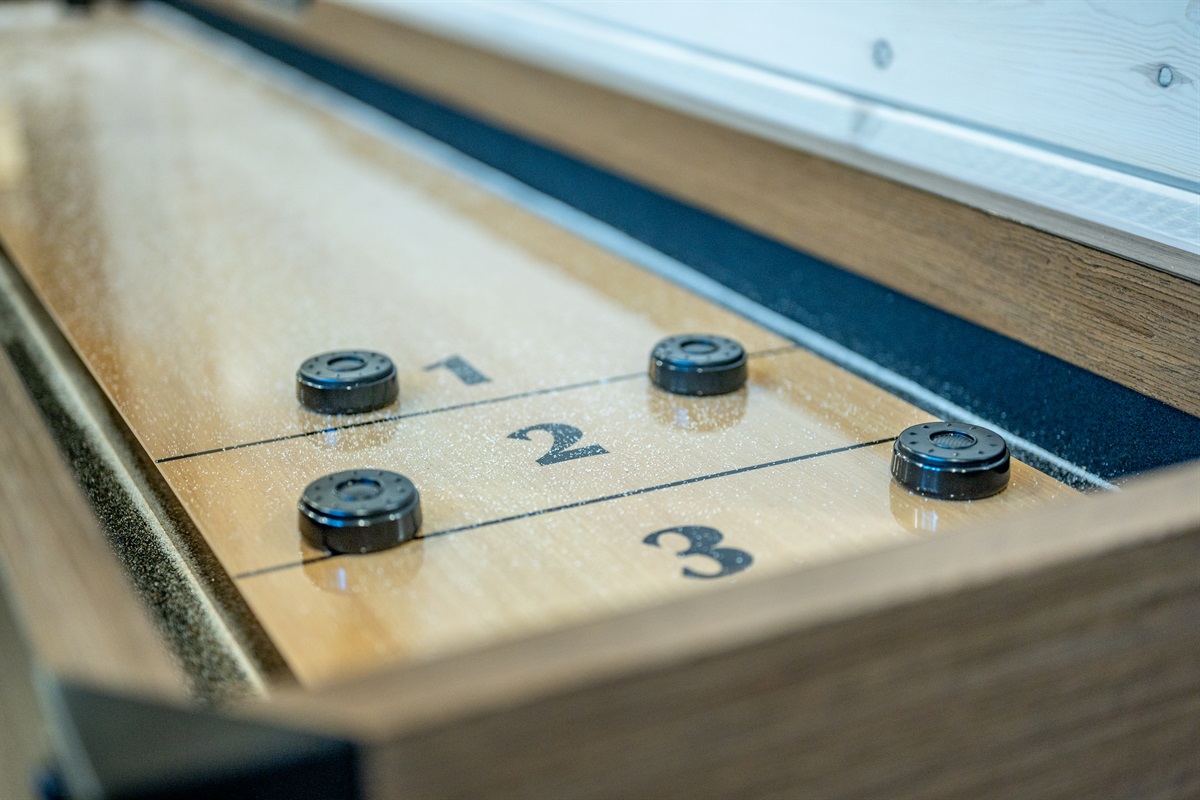 Try your skills in a game of shuffleboard!