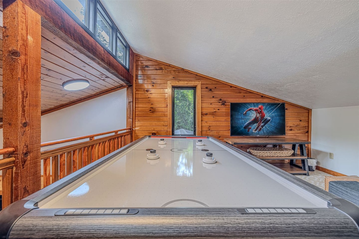 From air hockey tournaments to movie nights on the Smart TV, this loft-level hangout keeps the fun going long after sunset.