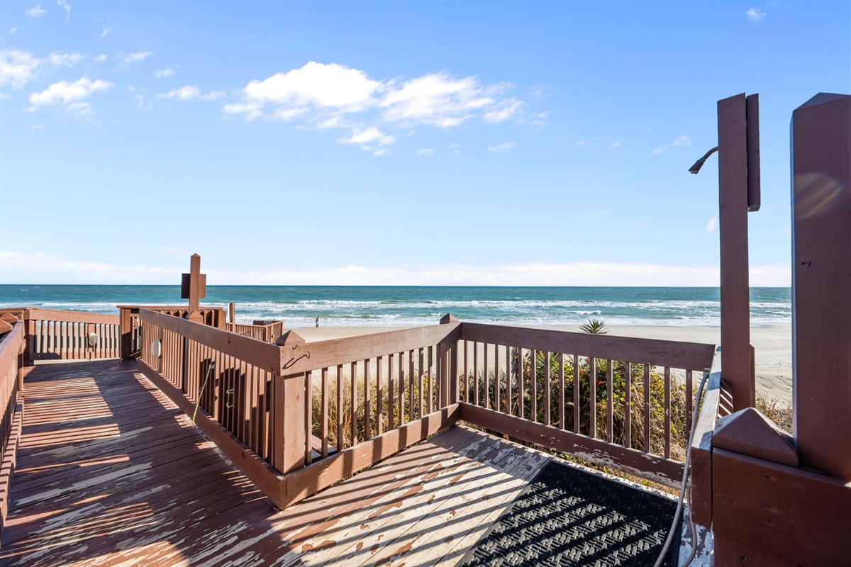 Step onto the private boardwalk for direct beach access, making it easy to go from your door to the sand in just moments