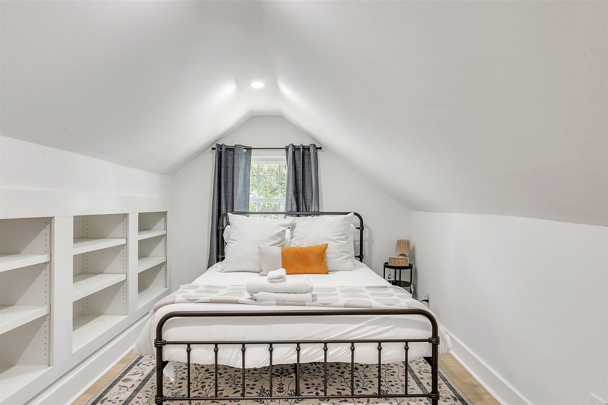 This cozy bedroom is a peaceful retreat at the end of the day.