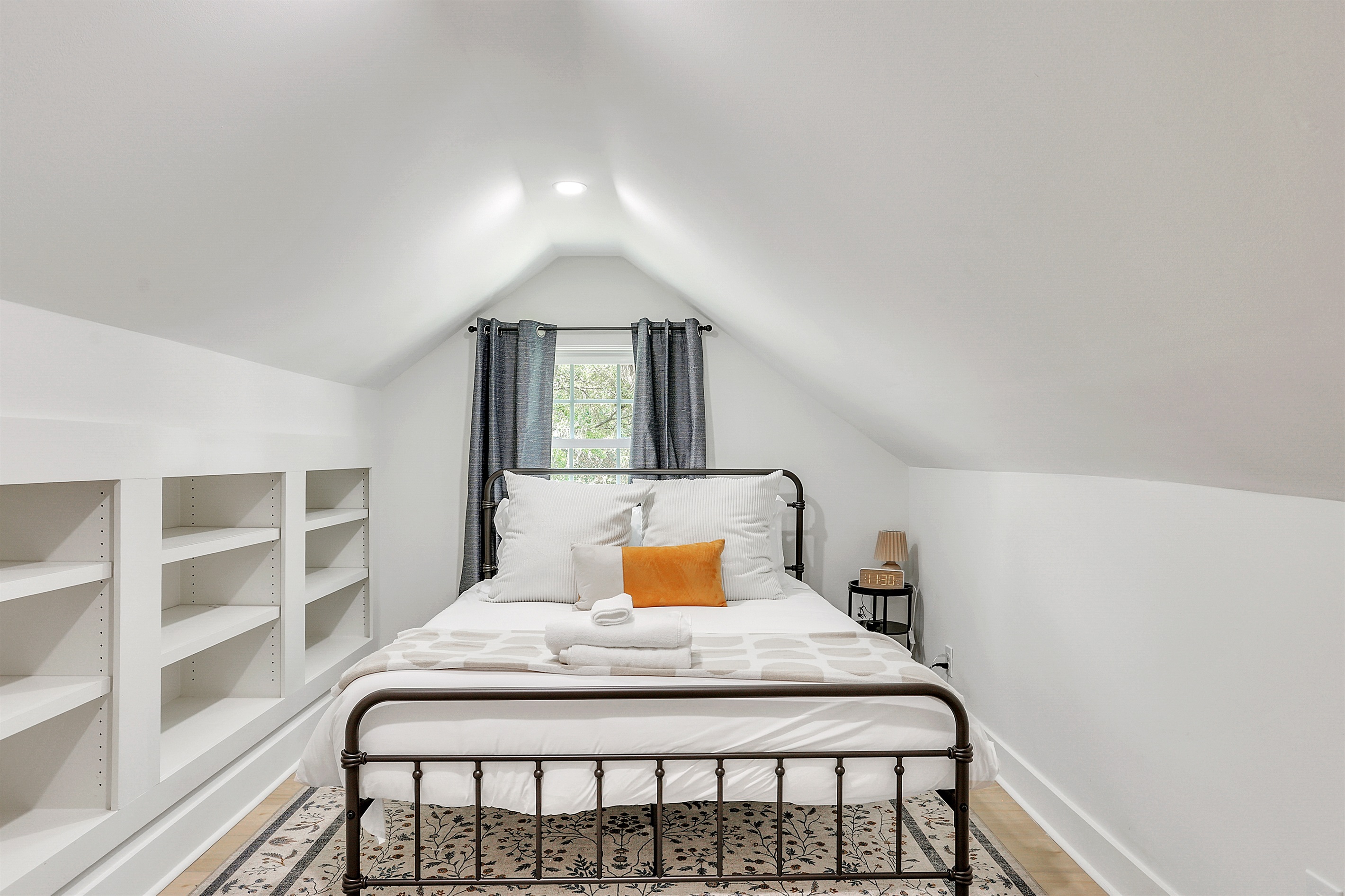 This cozy bedroom is a peaceful retreat at the end of the day.