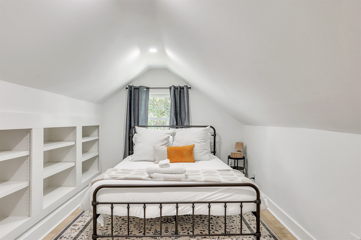 This cozy bedroom is a peaceful retreat at the end of the day.
