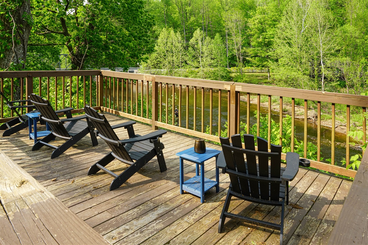 enjoy our deck right across the road overlooking the river!