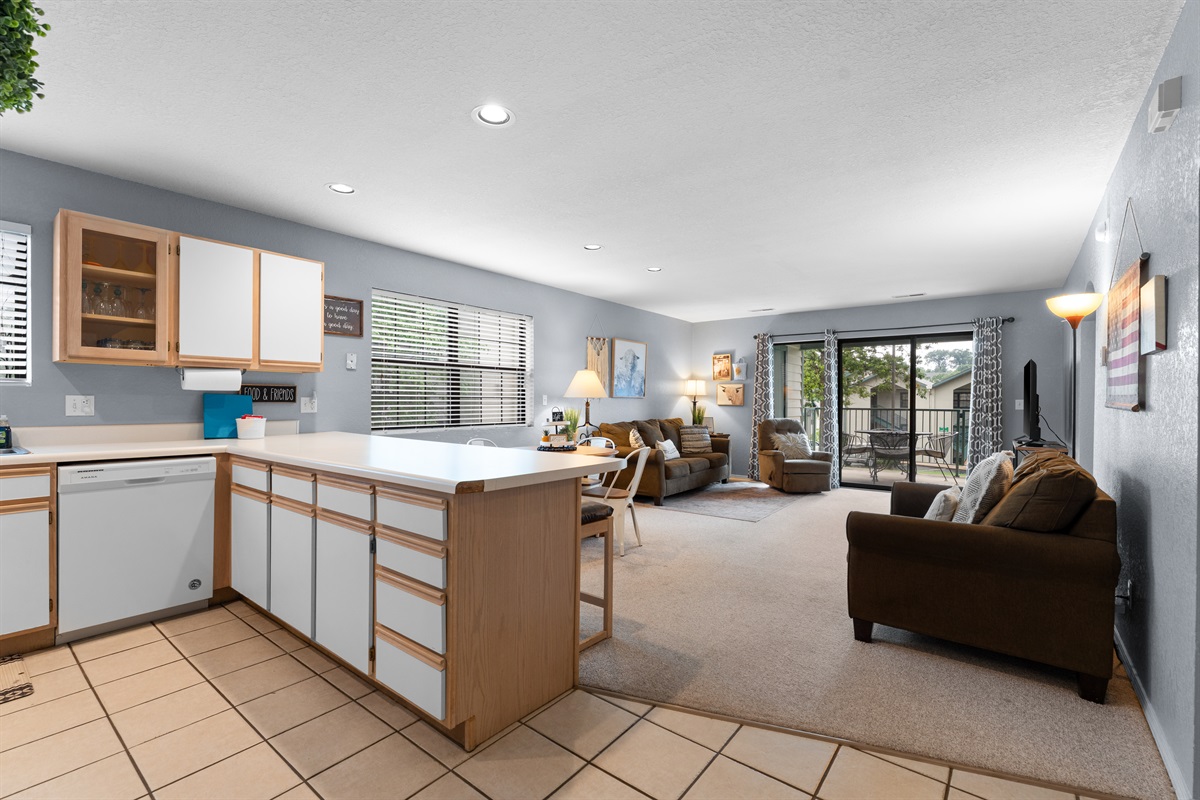 Cook, snack, or chat with the group in a bright open layout that keeps everyone connected.