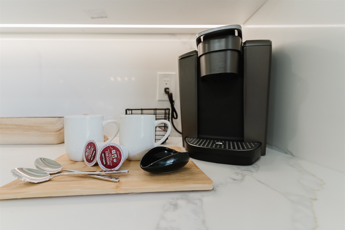 Fully equipped kitchen with everything needed for home-cooked meals. Modern appliances and ample counter space for easy meal prep. Bright and functional kitchen perfect for extended stays.