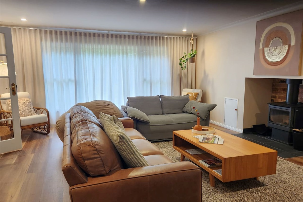 Seating includes a 3-seater leather couch, sofa bed couch & beanbag