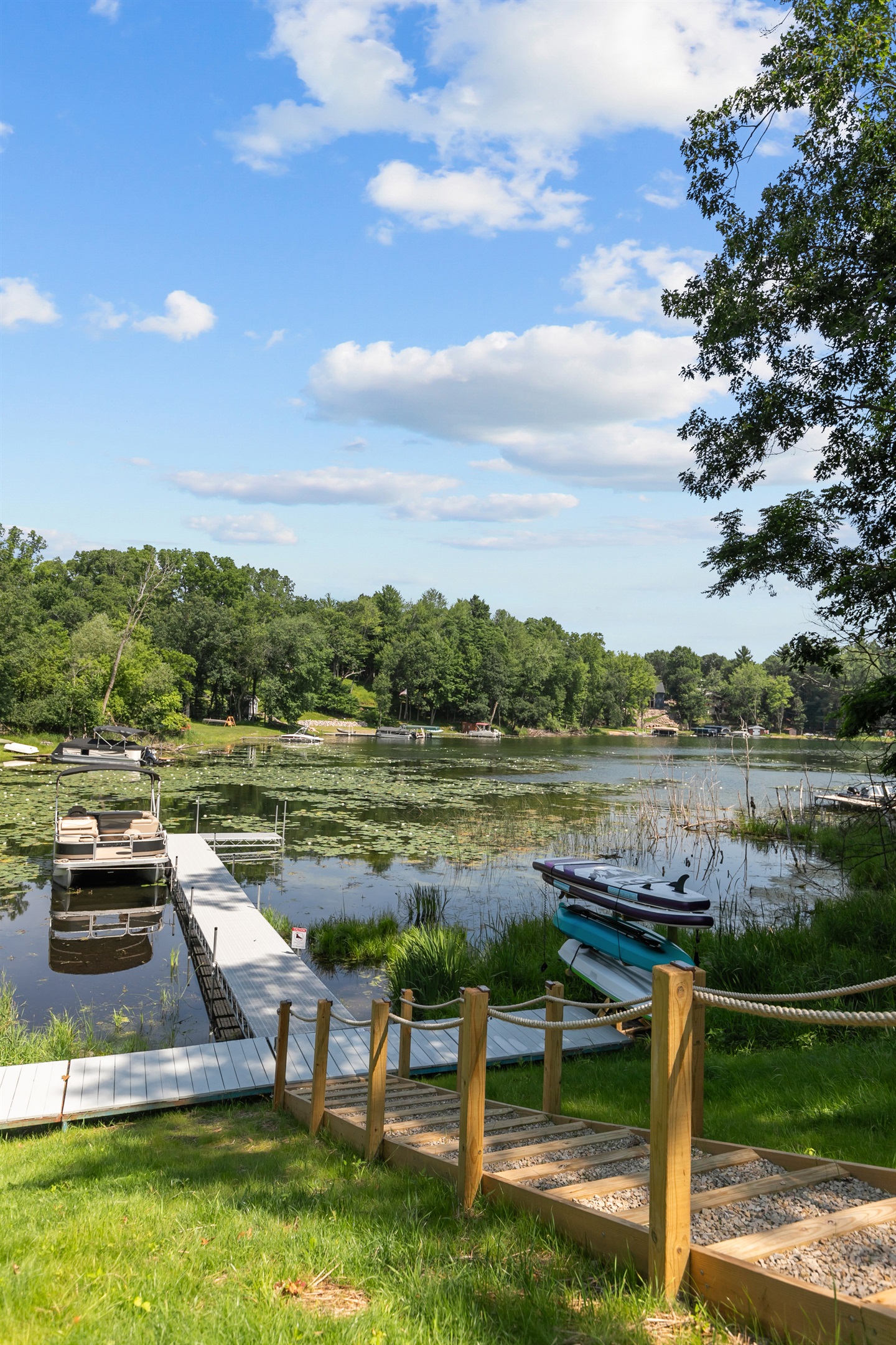 Follow the nautical-style steps down to the lake, where peaceful waters and beautiful views await.