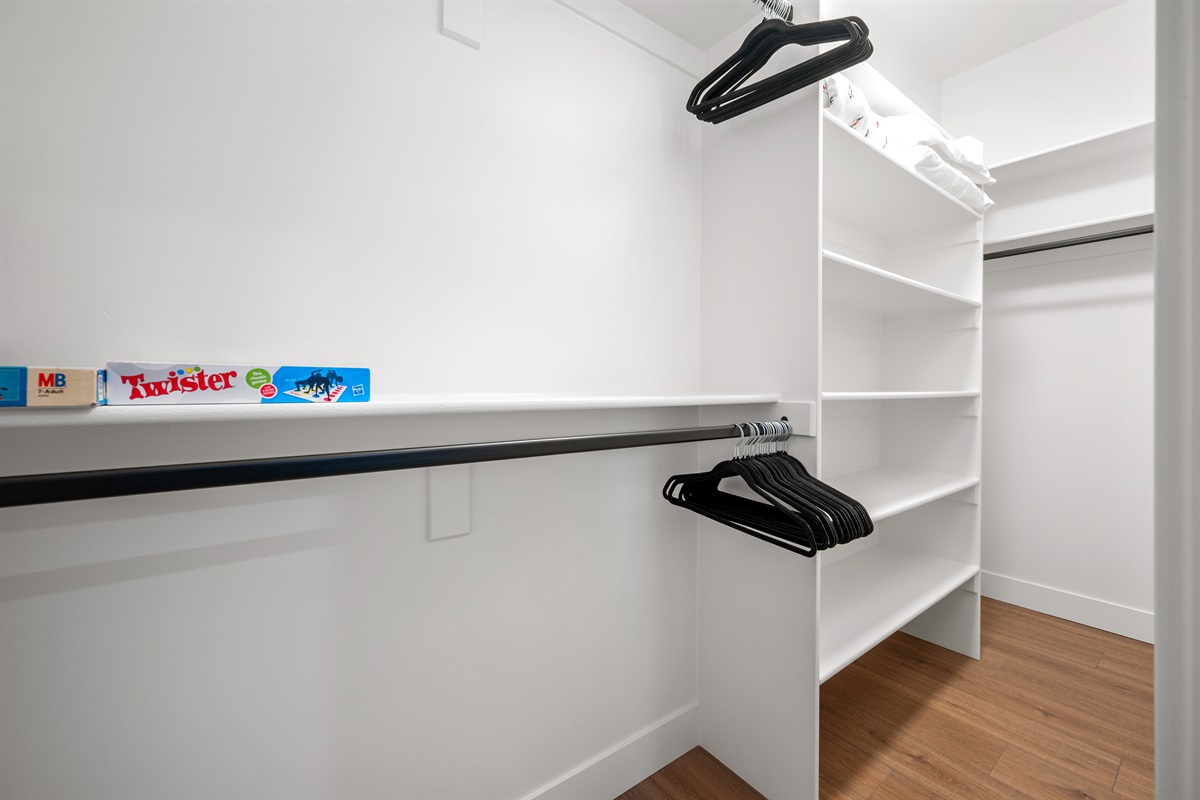 The bunkroom features a walk-in closet stocked with games for everyone to enjoy.