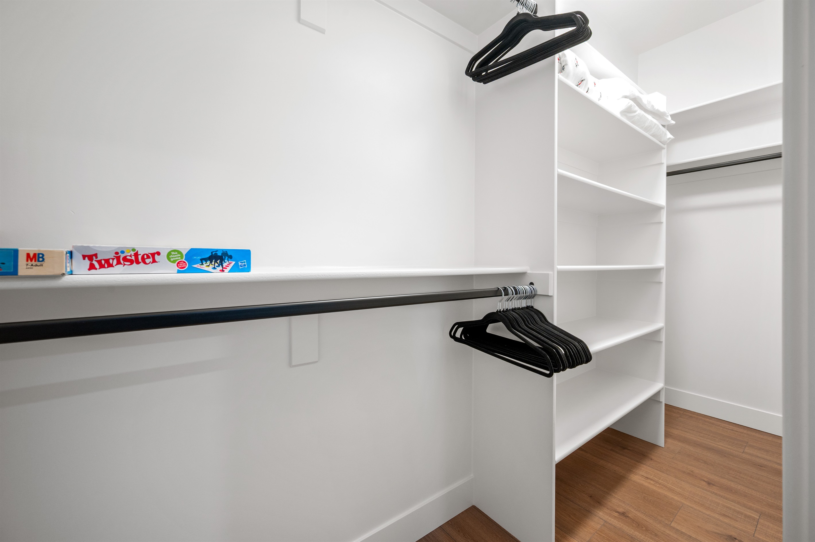 The bunkroom features a walk-in closet stocked with games for everyone to enjoy.