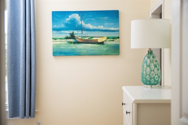 Unwind in our coastal-inspired haven, complete with a plush queen-size bed for dreamy nights and rejuvenating mornings.