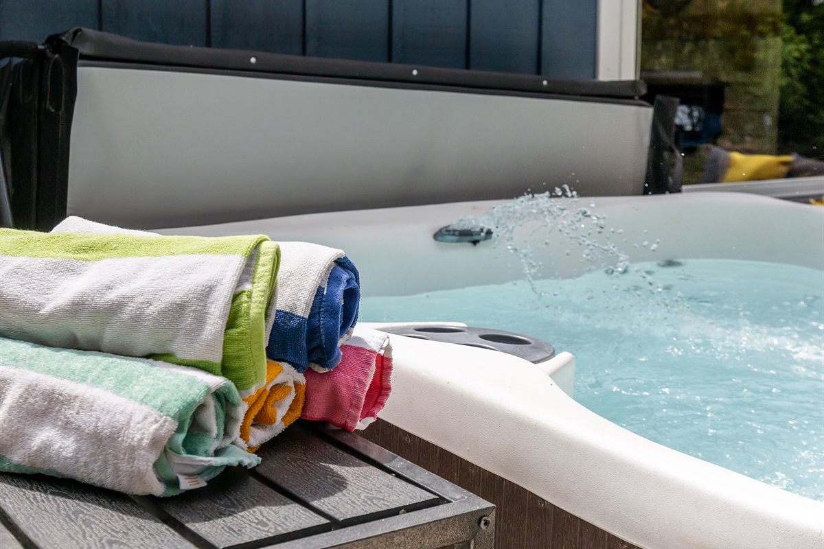 Sit back, enjoy the bubbles, and take in the beauty of your lakeside retreat.