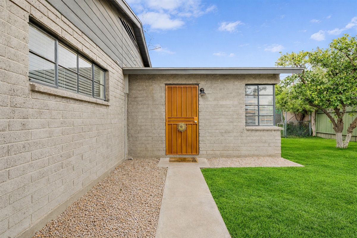 Front door access to the studio apartment.