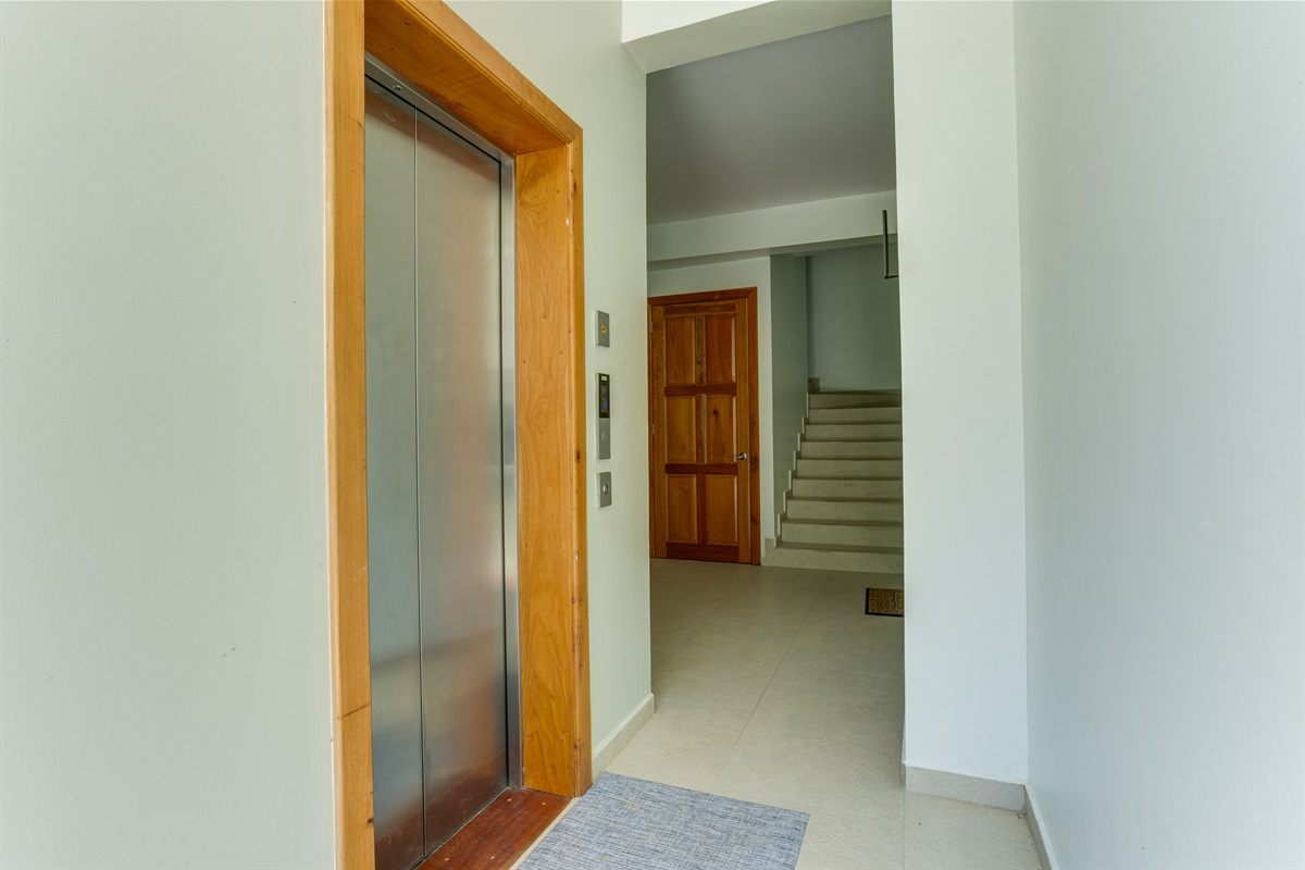 Elevator and Entrance to Unit