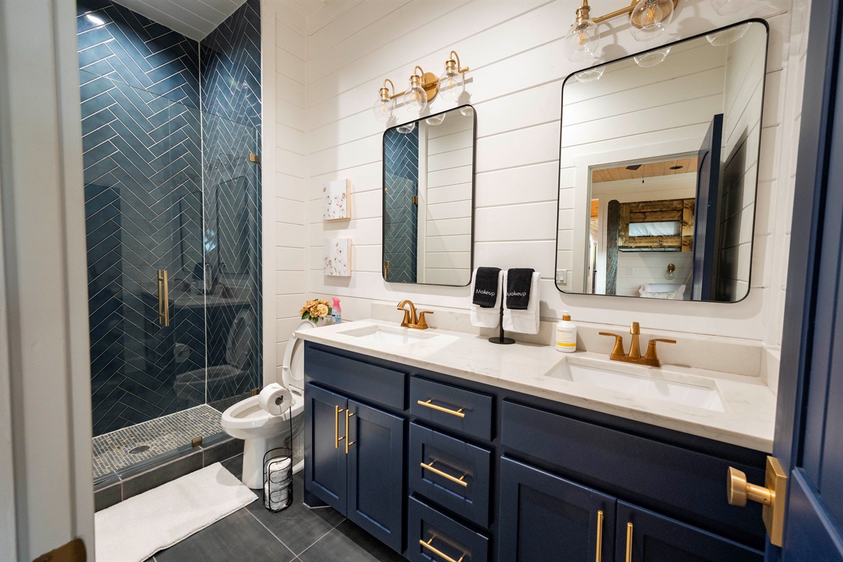 Contemporary bathroom with sleek finishes and upscale cabin style