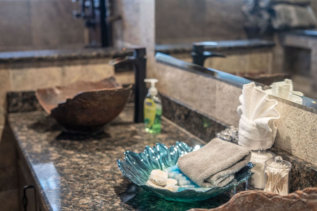 The bathroom counter is stocked and styled with care — everything you need is right there, so you can settle in and feel at home without a second trip to the store.