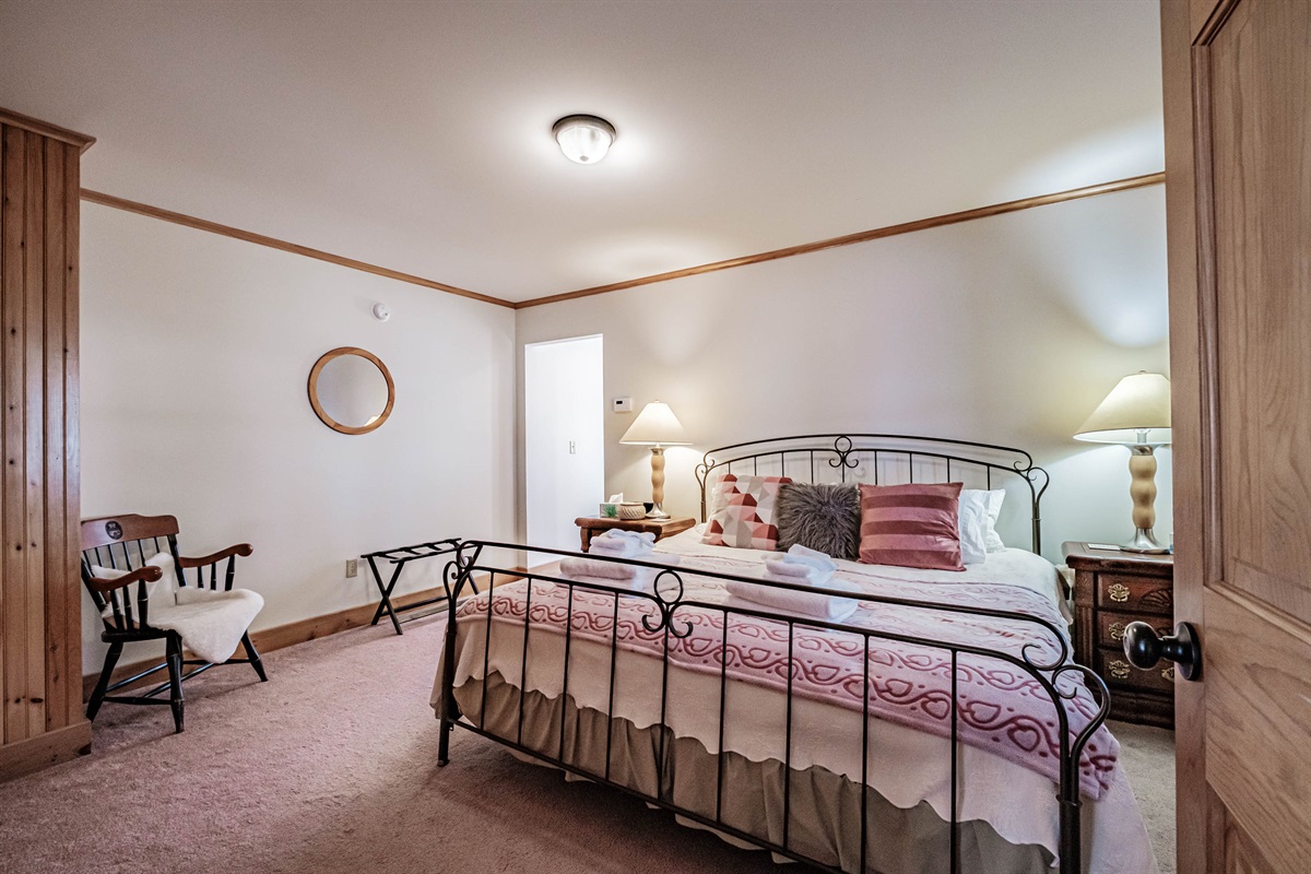 Master suite featuring a comfortable king bed.