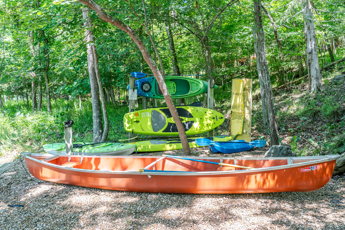 Load up the kayaks or grab a paddle board — three kayaks, two paddleboards, a canoe and a floating lily pad are all yours to explore the lake.