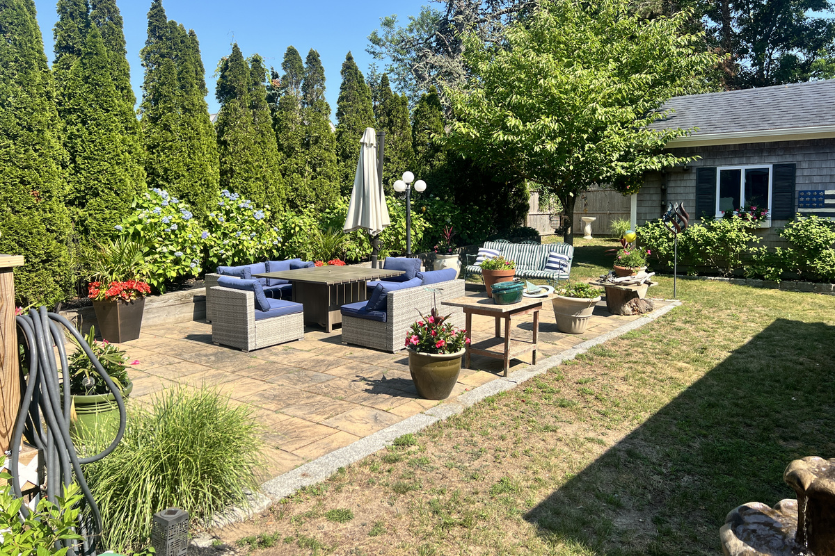 Spacious garden patio, perfect for outdoor dining