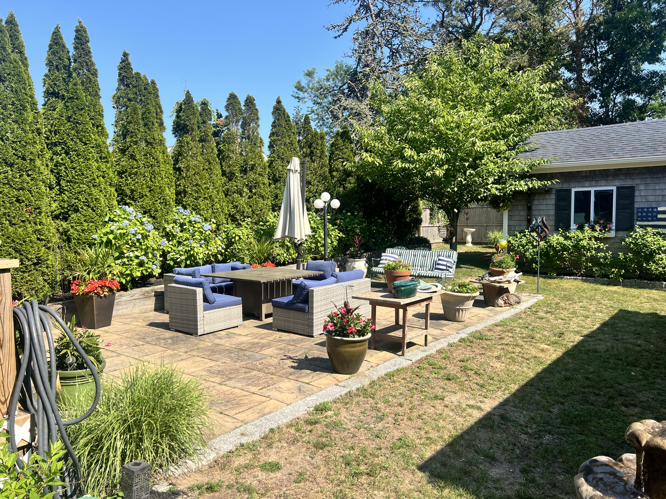Spacious garden patio, perfect for outdoor dining