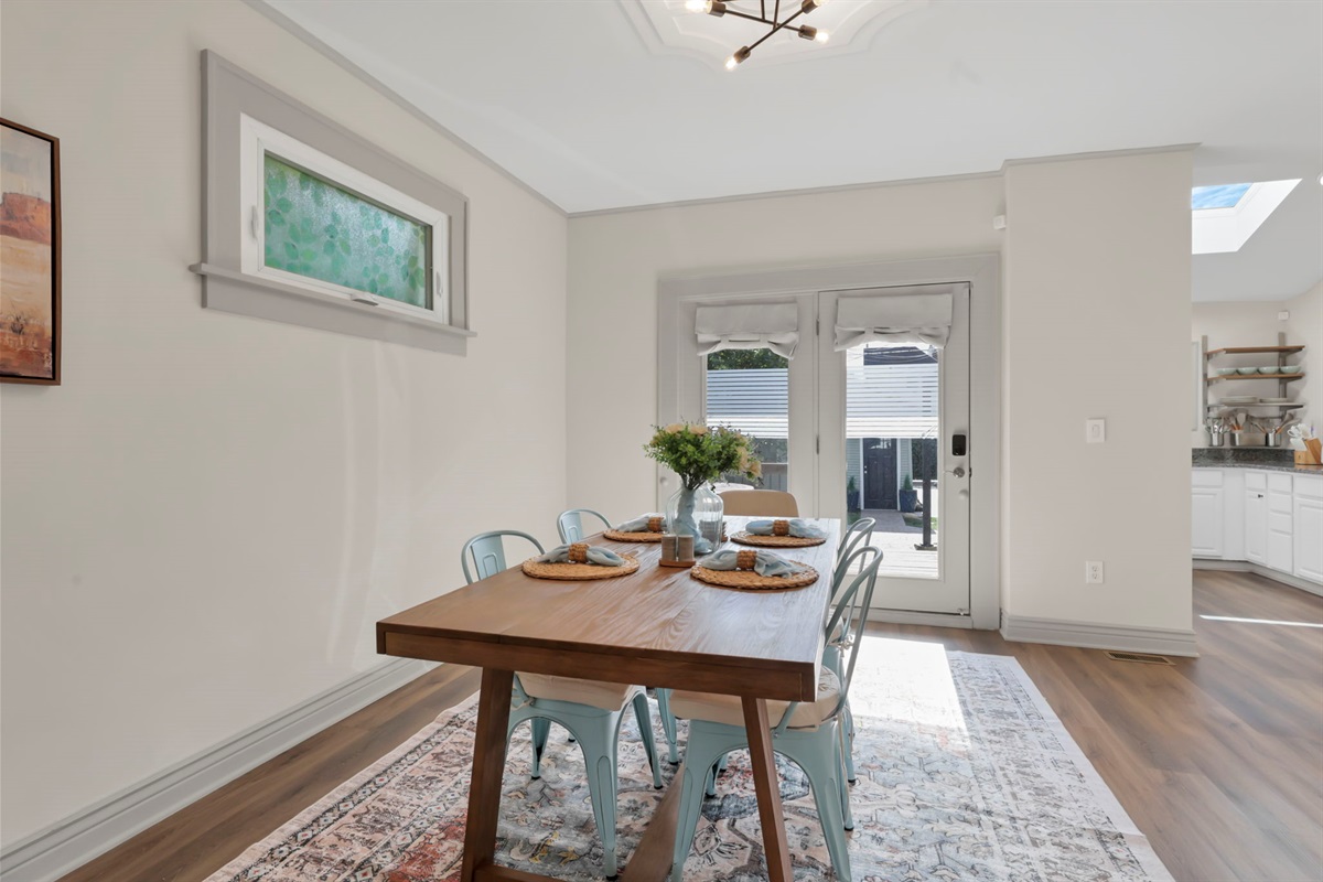 Dining room; doors leading to back deck