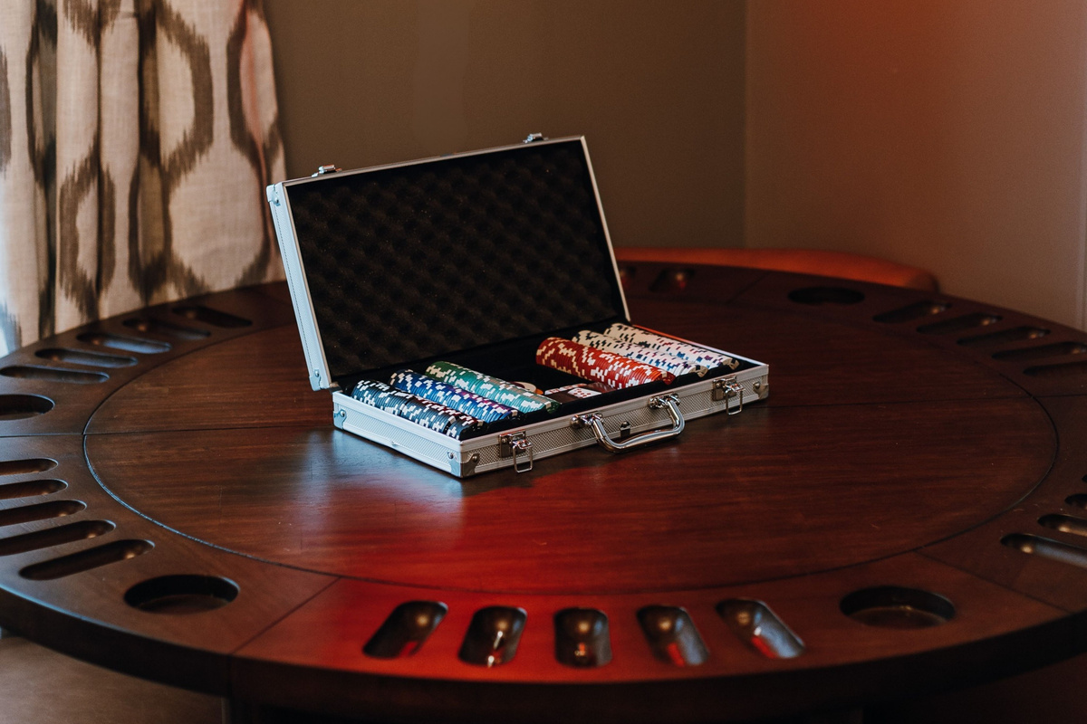 Challenge your group to poker night around the custom game table.