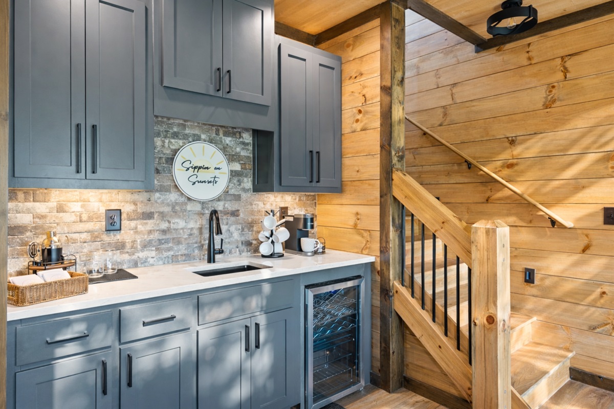 Where mornings begin and evenings sparkle. Wet bar, cava for wine and coffee maker.