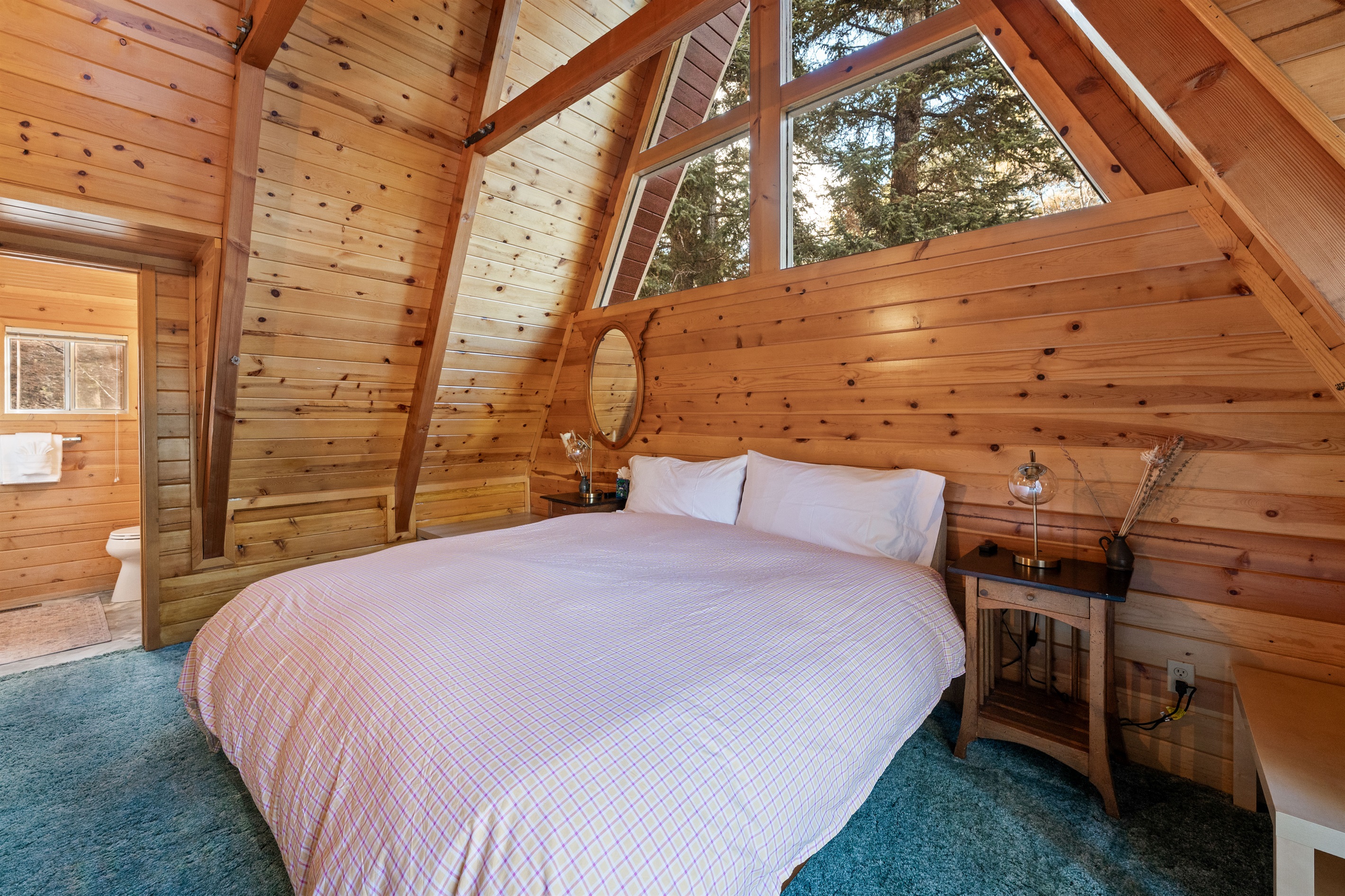 Master bedroom has king bed