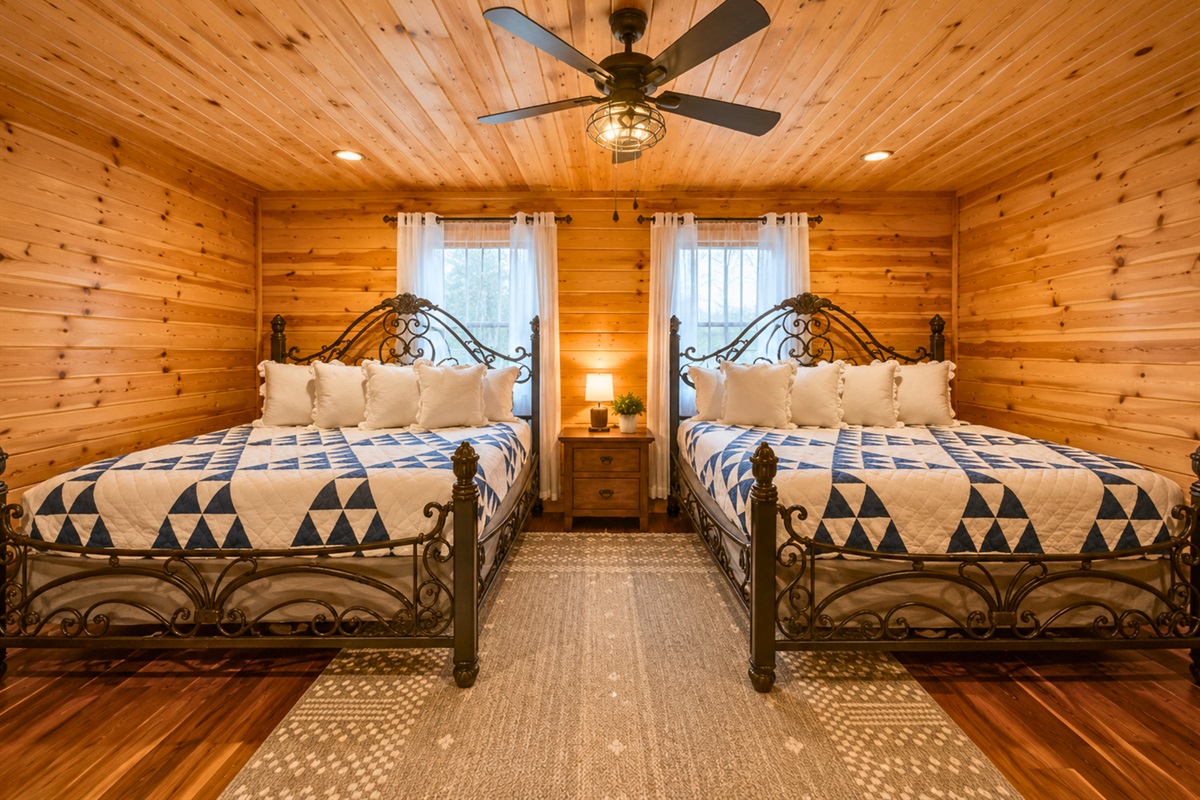 Matching wood interiors and warm tones create a relaxed lodge-style atmosphere throughout the room.