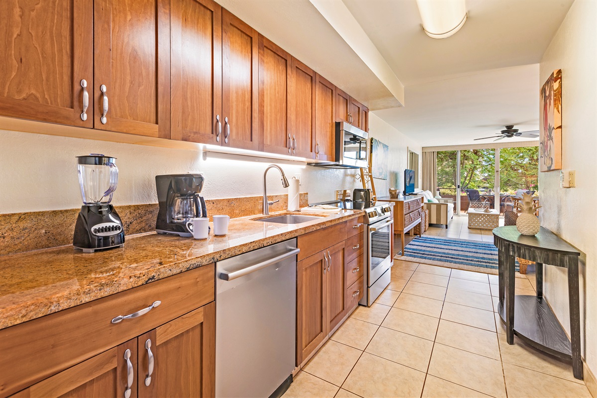 Modern kitchen with upgraded cabinetry and stainless steel appliances, designed for culinary convenience