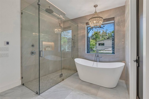 Relax in the tub or enjoy the over-sized shower with waterfall shower-head.