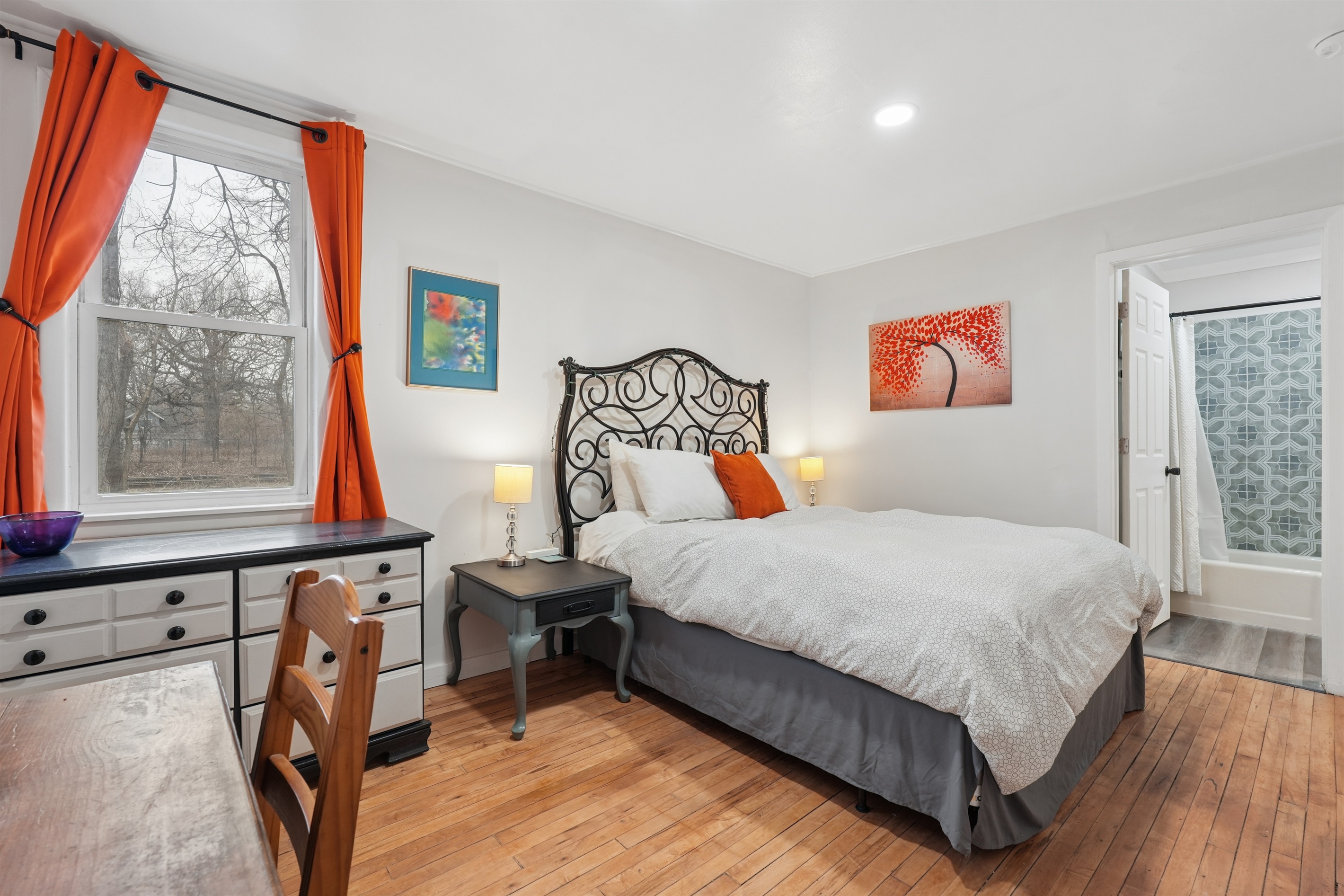 Enjoy the desk and dresser in the queen bedroom provided for your convenience. There's a closet as well.