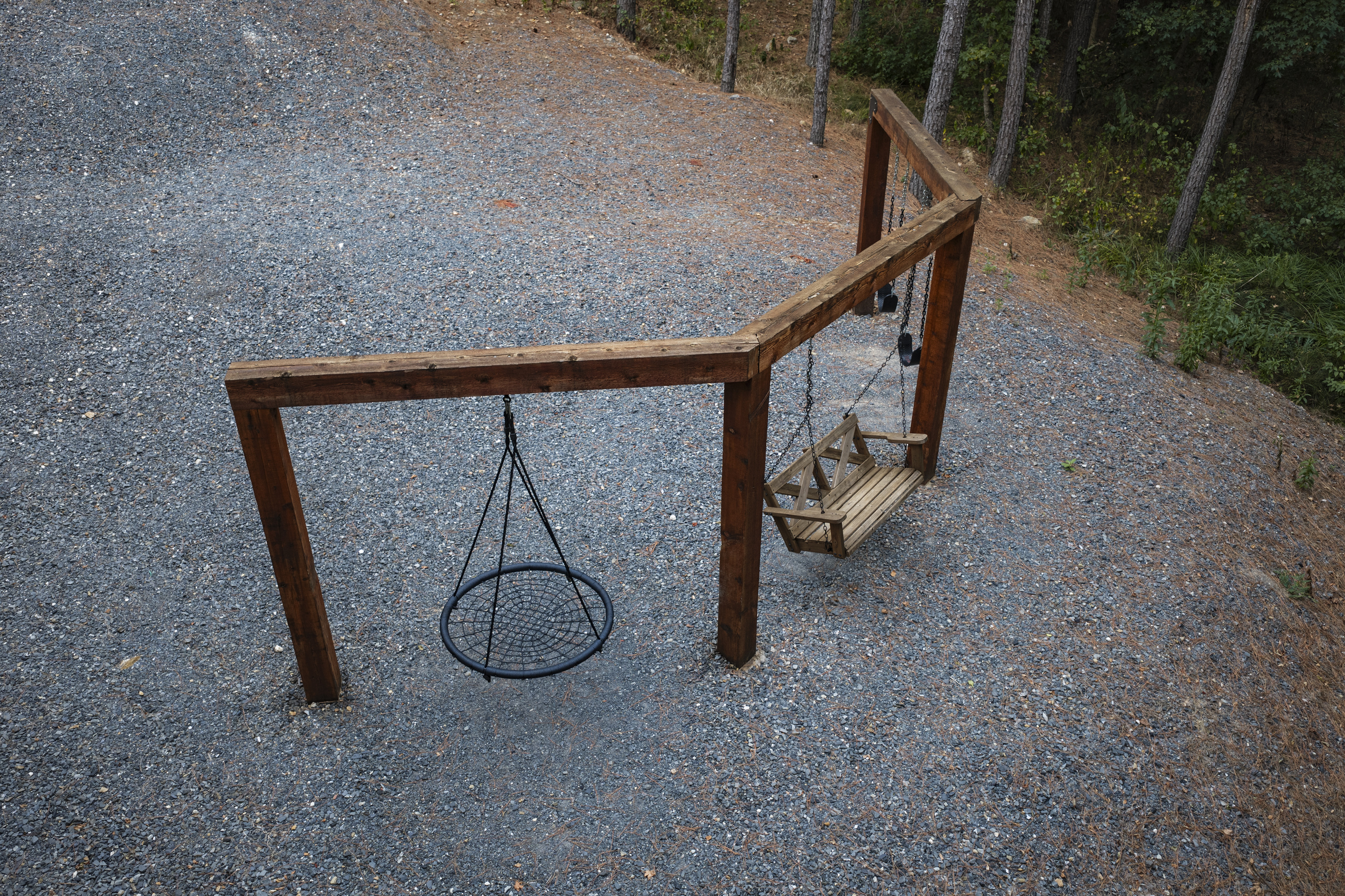 Breathe in the fresh forest air while the kids enjoy the outdoor swings just steps from the cabin.